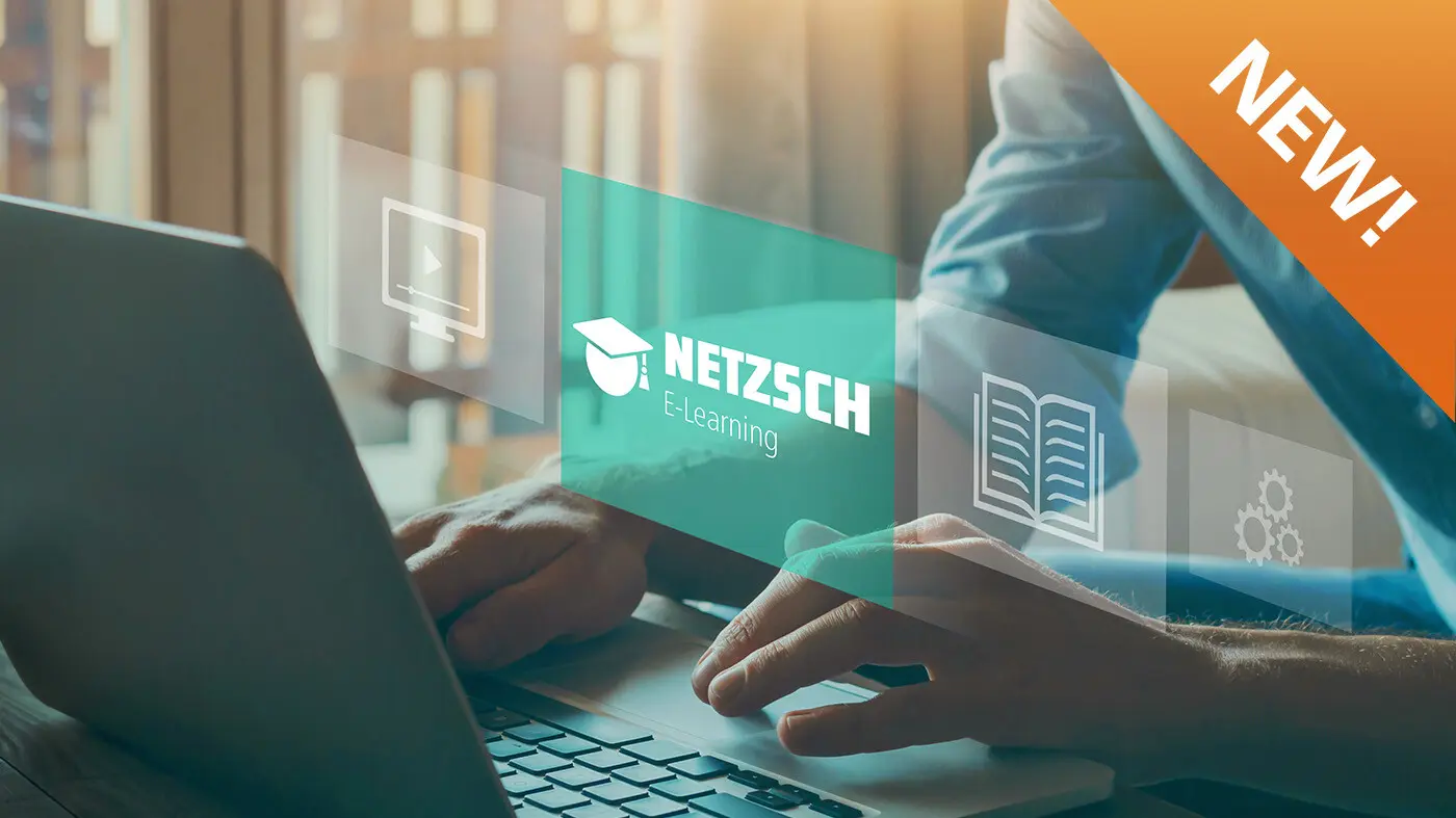 Hands typing on a laptop next to a window, showcasing NETZSCH E-Learning platform for thermal analysis and rheology training.