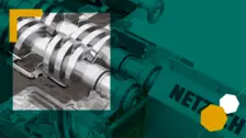 Close-up of NETZSCH multi screw pump showing intermeshing screws for smooth, high-pressure industrial fluid transfer.